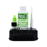 Open Benchmark Alkalinity Test Kit with reagents and syringes arranged in the stand